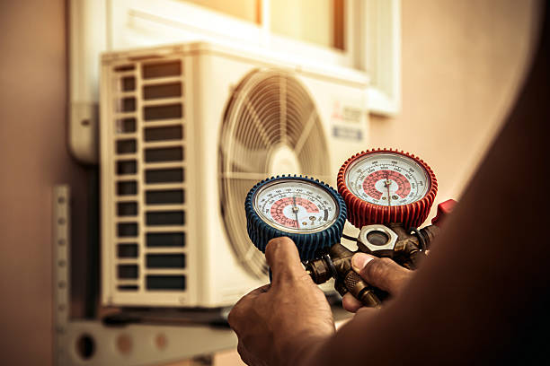 Professional Air Conditioning Service technician working in Sanford, CO